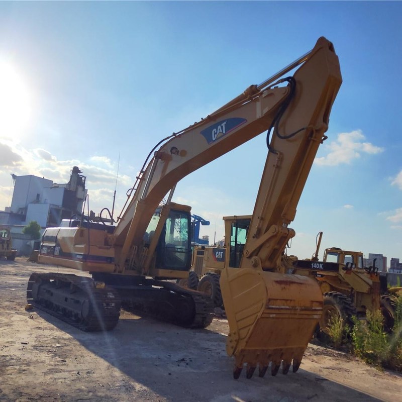 Tweedehands CAT 325BL Graafmachine Trader 25 Ton 125,3kw met 1,1m3 emmer