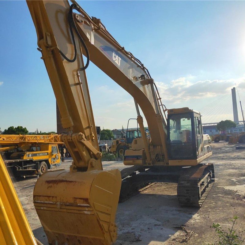 Tweedehands CAT 325BL Graafmachine Trader 25 Ton 125,3kw met 1,1m3 emmer