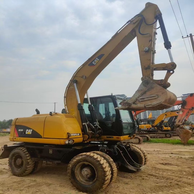 Tweedehands graafmachine Originele Cat M315D Gebruikte 15ton wielgraafmachine met bak van 0,61 m3