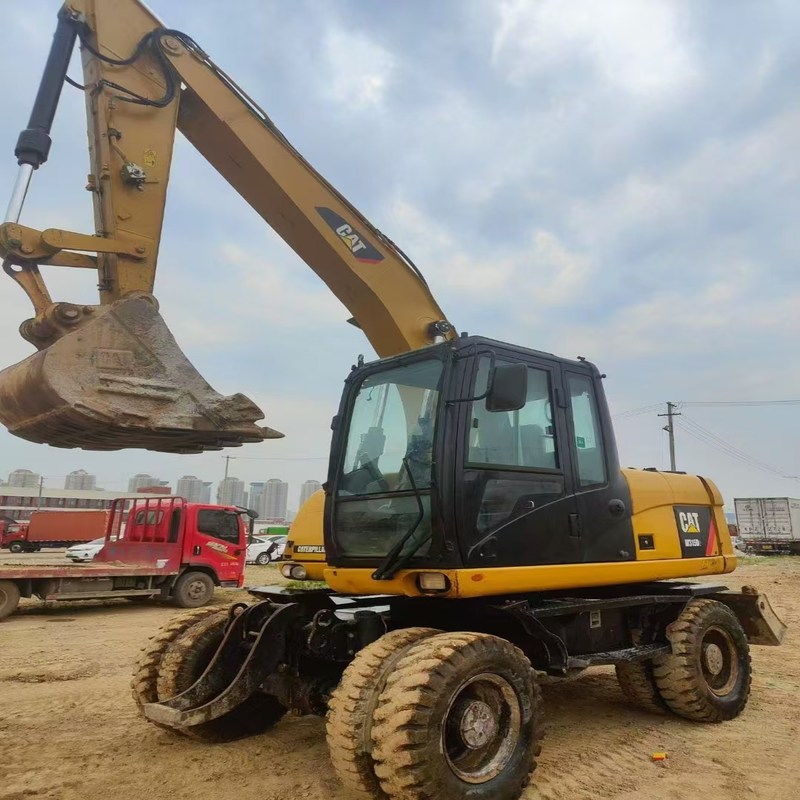Tweedehands graafmachine Originele Cat M315D Gebruikte 15ton wielgraafmachine met bak van 0,61 m3